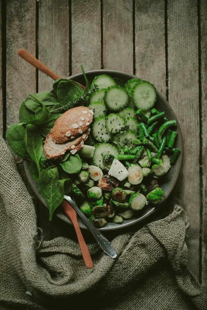 A bowl of greens and vegetables